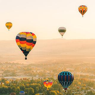 Photo of hot air balloons in the sky